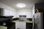 Fully equipped kitchen in Waterville Valley one bedroom vacation condo